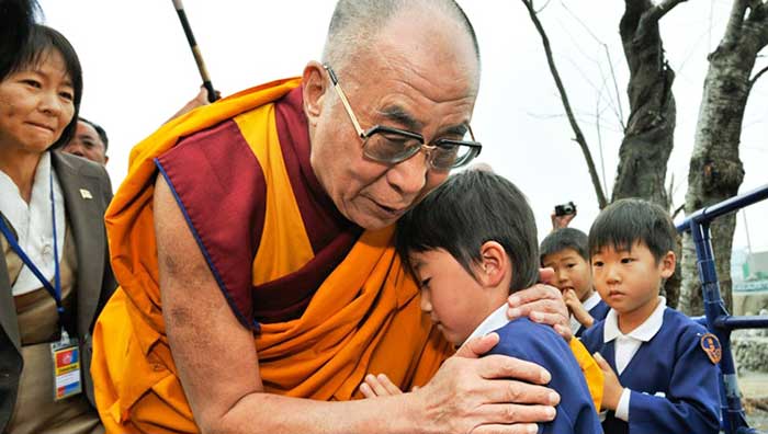 Dalai Lama apologises to boy, his family