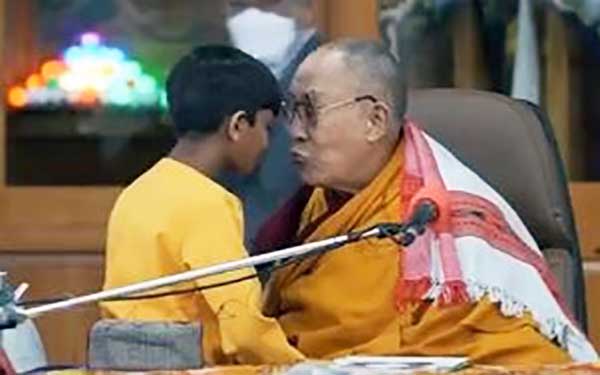 Dalai Lama 'caught' on video kissing boy on lips