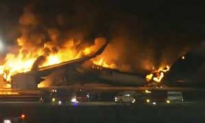 Japan Airlines plane catches fire at Tokyo airport; all 379 passengers, crew escape