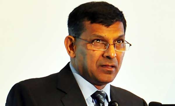 Shifting to old pension scheme may lead to liability add-up in future: Raghuram Rajan