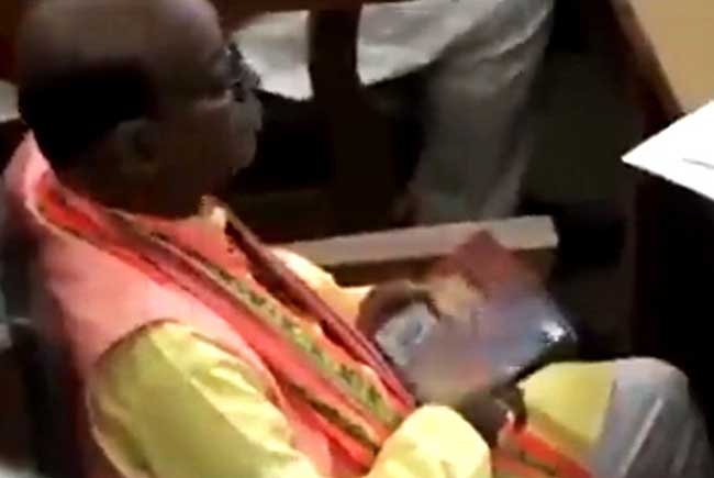 Tripura BJP MLA watches obscene video on mobile phone in Assembly