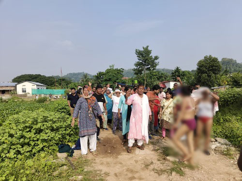 Women tear their clothes to protest against eviction drive in Guwahati